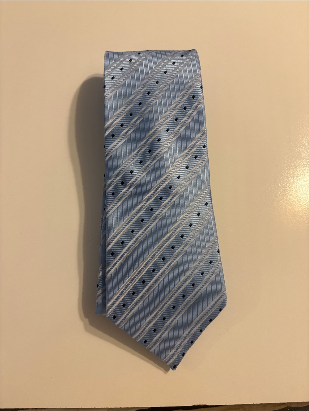Silk light blue, navy and white tie. 100% silk.